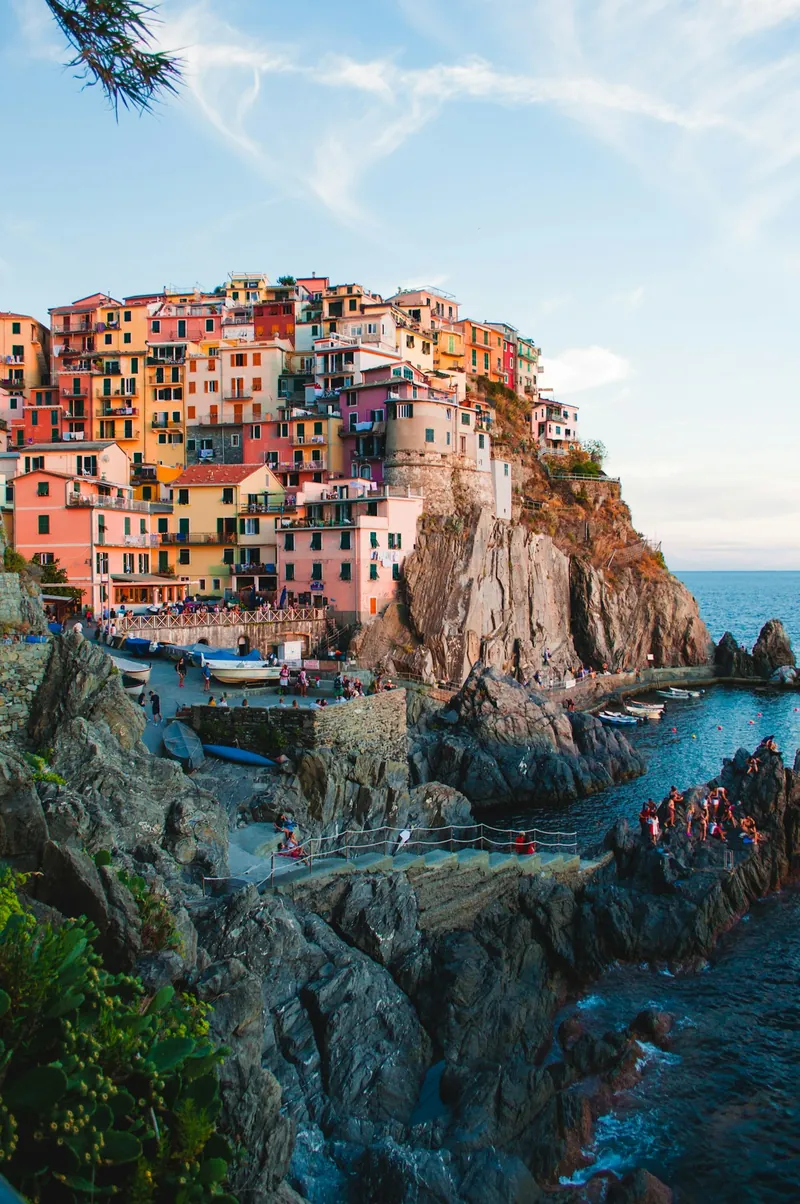 The colourful clifftop houses of Riomaggiore in Cinque Terre, Italy, above the Mediterranean